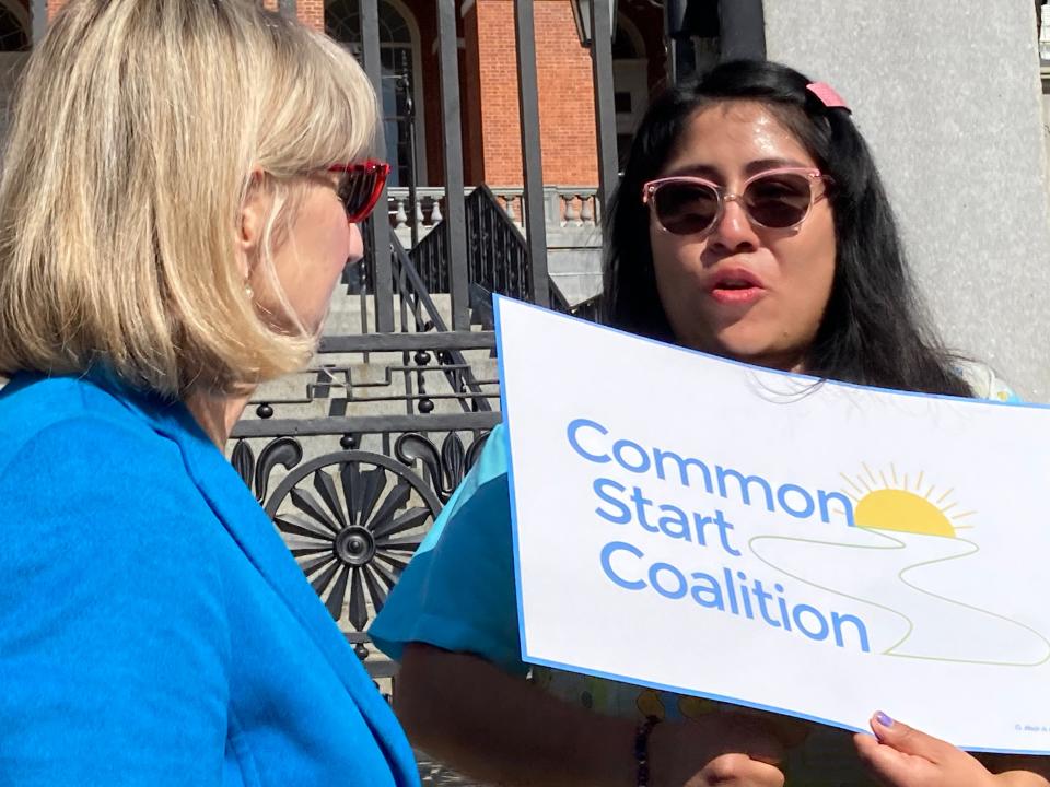 Sen. President Karen Spilka, D-Ashland, speaks with Alejandra de la Cruz, an early education provider at a rally on the State House steps Thursday, March 14 held to promote the Early Ed Act, a sweeping bill that would support early childhood education and care providers and clients across the state.