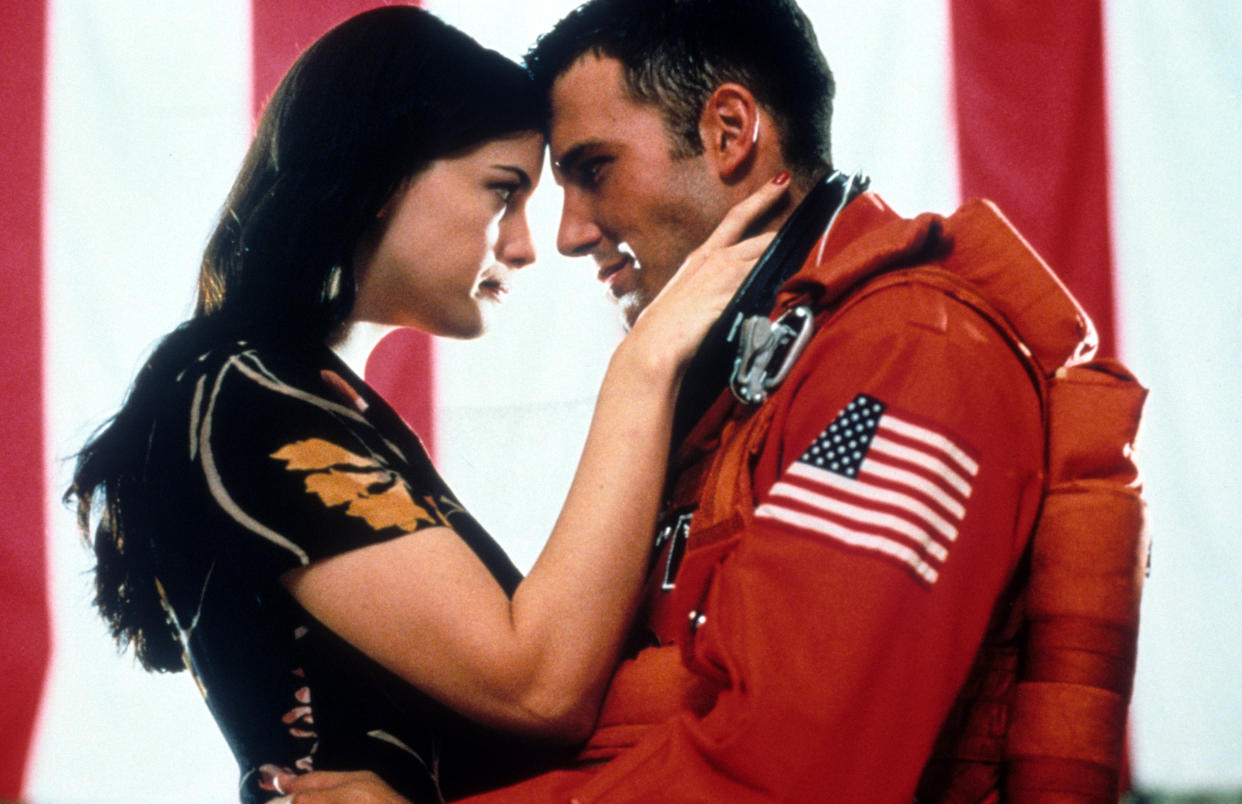 Liv Tyler and Ben Affleck embrace in a scene from the film 'Armageddon', 1998. (Photo by Touchstone/Getty Images)