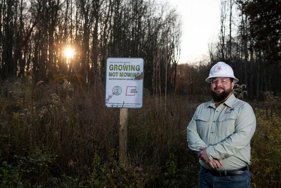 Joe Alexander, American Electric Power forrester in the Chillicothe District, stands in front of the pollinator garden at Buzzard's Roost Nature Preserve on November 16, 2023, in Chillicothe, Ohio.