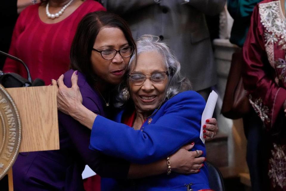 Former Mississippi State Rep. Alyce Clarke, D-Jackson, right, hugs State Rep. Tamarra Grace Butler-Washington, D-Jackson, after her comments at the ceremony where Clarke’s official portrait in the Mississippi State Capitol was unveiled. Rogelio V. Solis/AP