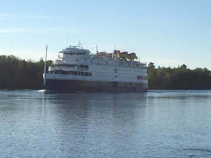 The M/V Victory I, a member of the USA River Cruises fleet, chugs its way past Mission Point at Rotary Park in Sault Ste. Marie.