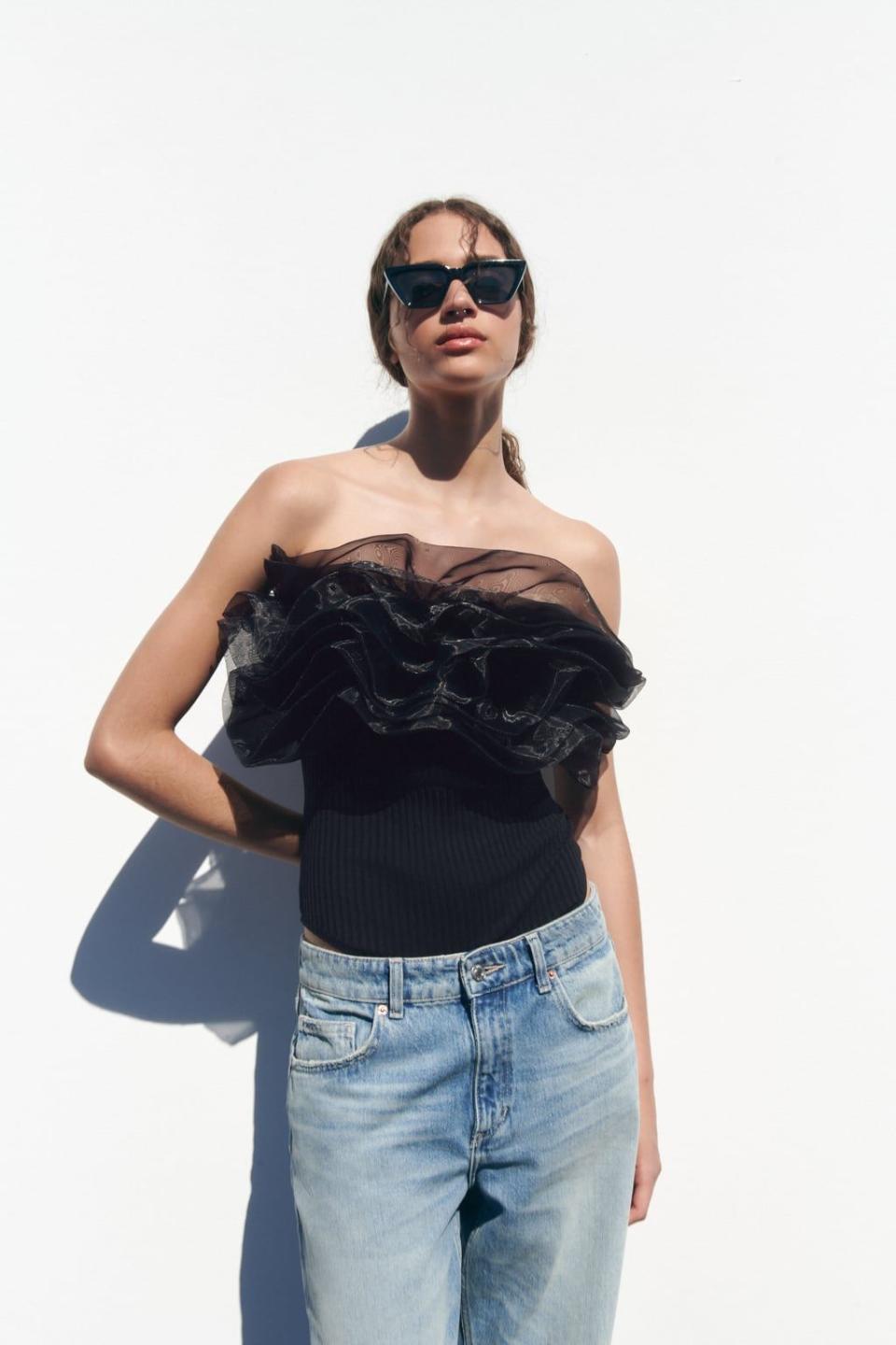 <p><a href="https://go.redirectingat.com?id=74968X1596630&url=https%3A%2F%2Fwww.zara.com%2Fus%2Fen%2Forganza-ruffle-rib-bodysuit-p00858331.html&sref=https%3A%2F%2F" rel="nofollow noopener" target="_blank" data-ylk="slk:Shop Now;elm:context_link;itc:0;sec:content-canvas" class="link ">Shop Now</a></p><p>ORGANZA RUFFLE RIB BODYSUIT</p><p>$35.90</p><p>zara.com</p><span class="copyright">Zara</span>