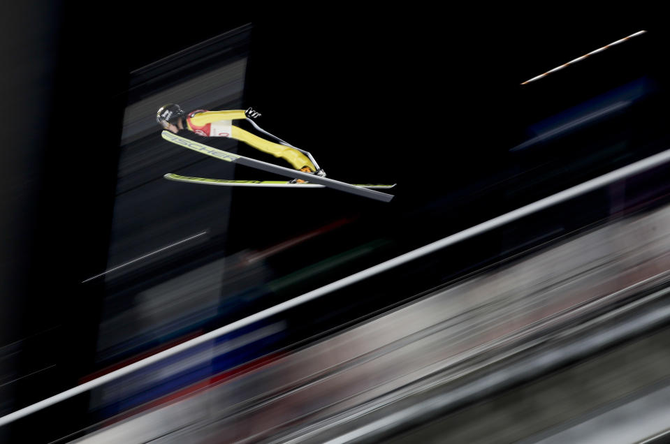 <p>Junshiro Kobayashi, of Japan, soars through the air during the men’s normal hill individual ski jumping qualifier ahead of the 2018 Winter Olympics in PyeongChang, South Korea, Thursday, Feb. 8, 2018. (AP Photo/Matthias Schrader) </p>