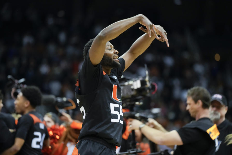 Miami guard Wooga Poplar celebrates after their win against Texas in an Elite 8 college basketball game in the Midwest Regional of the NCAA Tournament Sunday, March 26, 2023, in Kansas City, Mo (AP Photo/Jeff Roberson)