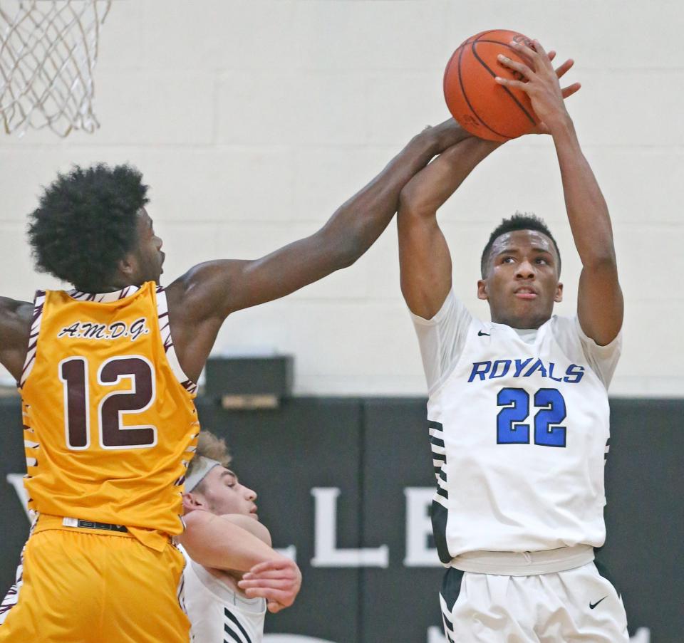 CVCA's Darryn Peterson grabs a second-quarter rebound over Walsh Jesuit's Keith Rivers on Tuesday, Feb. 15, 2022.