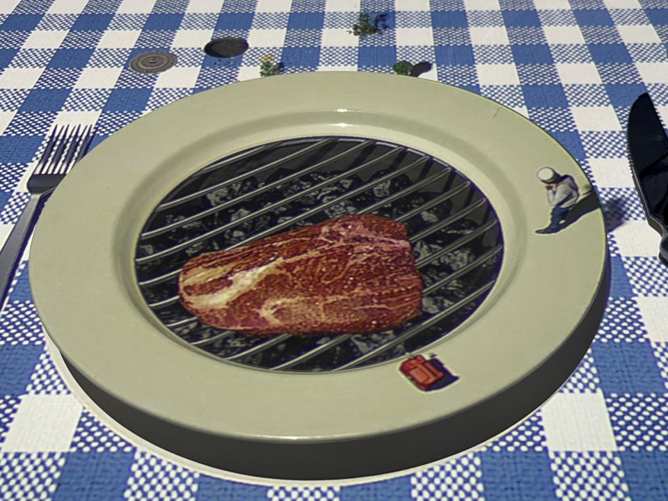 Table and plate at Le Petit Chef made to look like a picnic table and grill with steak on it