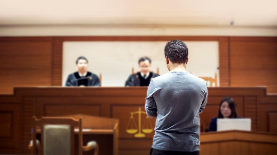 man in court room