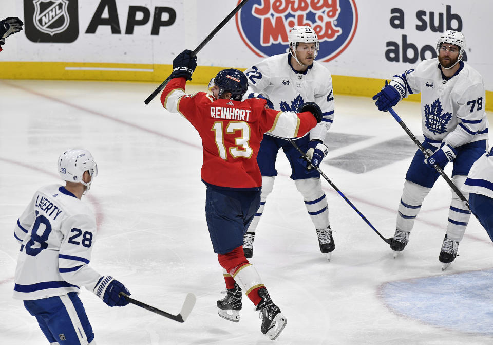 Florida Panthers center Sam Reinhart (13) reacts to scoring the game-winning goal against the Toronto Maple Leafs during overtime of Game 3 of an NHL hockey Stanley Cup second-round playoff series, Sunday, May 7, 2023, in Sunrise, Fla. (AP Photo/Michael Laughlin)