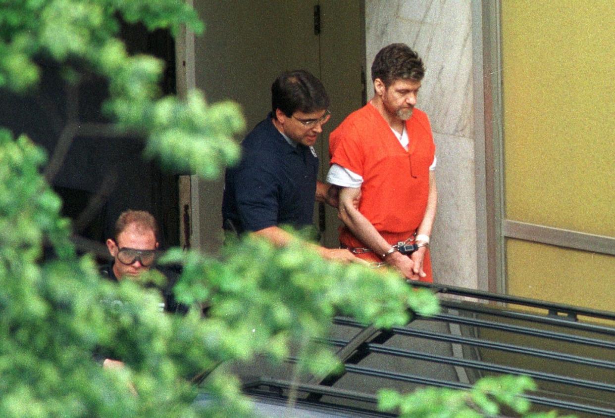 Ted Kaczynski was arrested after the longest and most expensive investigation in the FBI's history. <a href="https://www.gettyimages.com/detail/news-photo/convicted-unabomber-theodore-kaczynski-is-escorted-by-us-news-photo/106884098?adppopup=true" rel="nofollow noopener" target="_blank" data-ylk="slk:Rich Pedroncelli/AFP via Getty Images;elm:context_link;itc:0;sec:content-canvas" class="link ">Rich Pedroncelli/AFP via Getty Images</a>