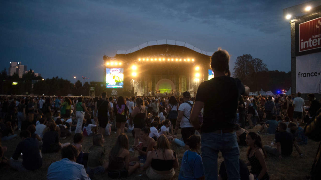 People wait in front of the main stage during the 18th edition of the Rock en Seine music festival in Saint-Cloud, on the western outskirts of Paris, on August 25, 2022. (Photo by Anna KURTH / AFP)