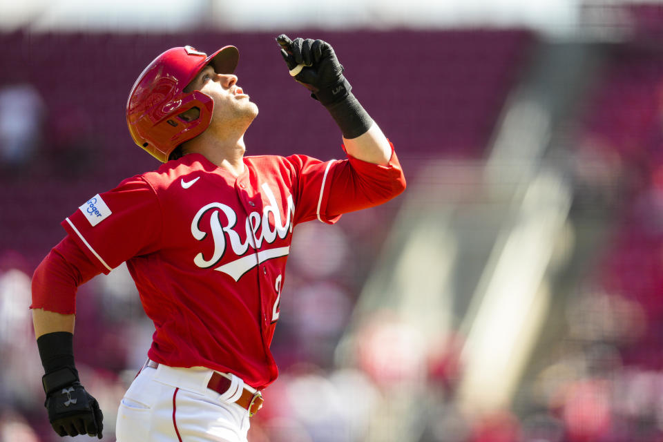 Cincinnati Reds' TJ Friedl reacts as he rounds the bases after hitting a solo home run against the Pittsburgh Pirates in the fifth inning of a baseball game in Cincinnati, Sunday, April 2, 2023. (AP Photo/Jeff Dean)