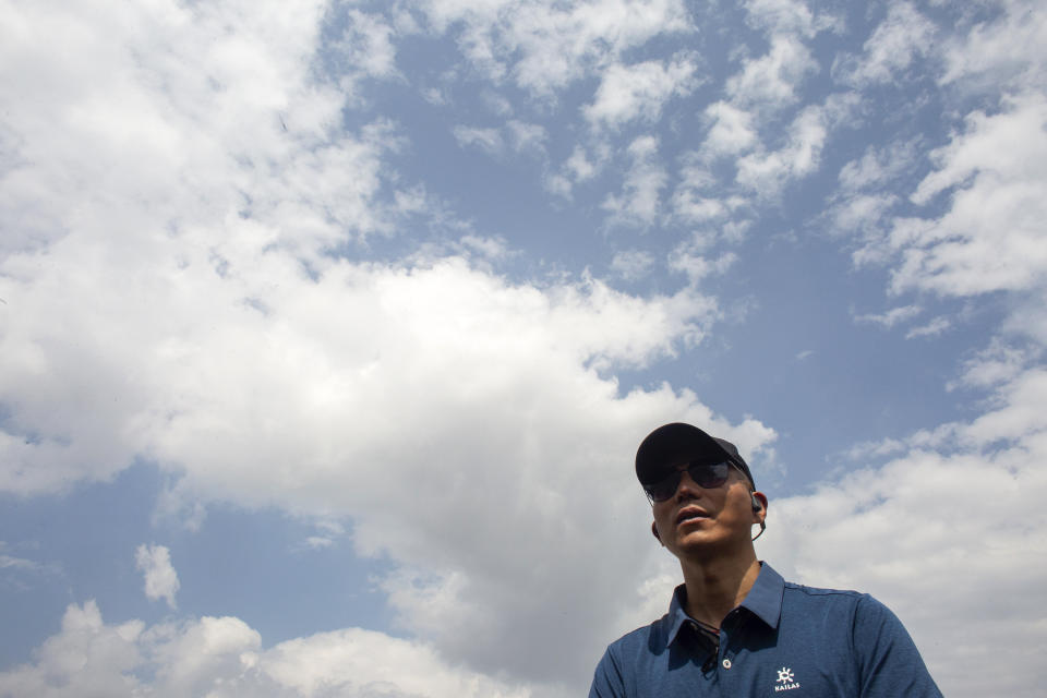 Chinese climber Zhang Hong, 44, who became the first blind Asian to scale Mount Everest upon return from the mountain sits during an interview with the Associated Press at a hotel in Kathmandu, Nepal, Monday, May 31, 2021.Zhang says he aims to climb the highest peaks on all seven continents and then travel to the North and South Poles. (AP Photos/Bikram Rai)