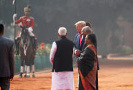 U.S. President Donald Trump and first lady Melania Trump walk with India's President Ram Nath Kovind, First Lady Savita Kovind and Prime Minister Narendra Modi as he arrives for his ceremonial reception at the forecourt of India's Rashtrapati Bhavan Presidential Palace in New Delhi, India, February 25, 2020. REUTERS/Al Drago