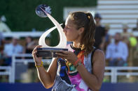 Daria Kasatkina, of Russia, kisses the Mubadala Silicon Valley Classic trophy after her 6-7 (2), 6-1, 6-2 victory against Shelby Rogers, of the United States, in San Jose, Calif., Sunday, Aug. 7, 2022. (AP Photo/Godofredo A. Vásquez)