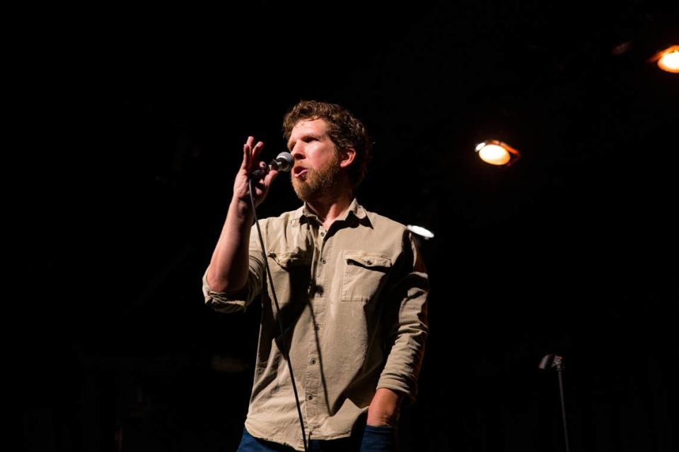 Comedian Kris Tinkle on stage. Photo courtesy of Kris Tinkle. Kris Tinkle