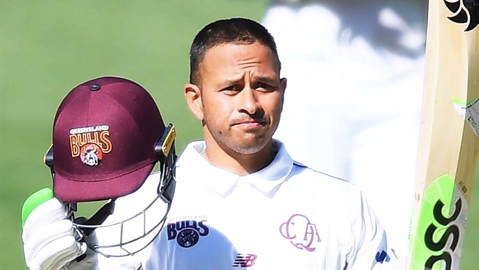 Usman Khawaja (pictured) celebrating his century.