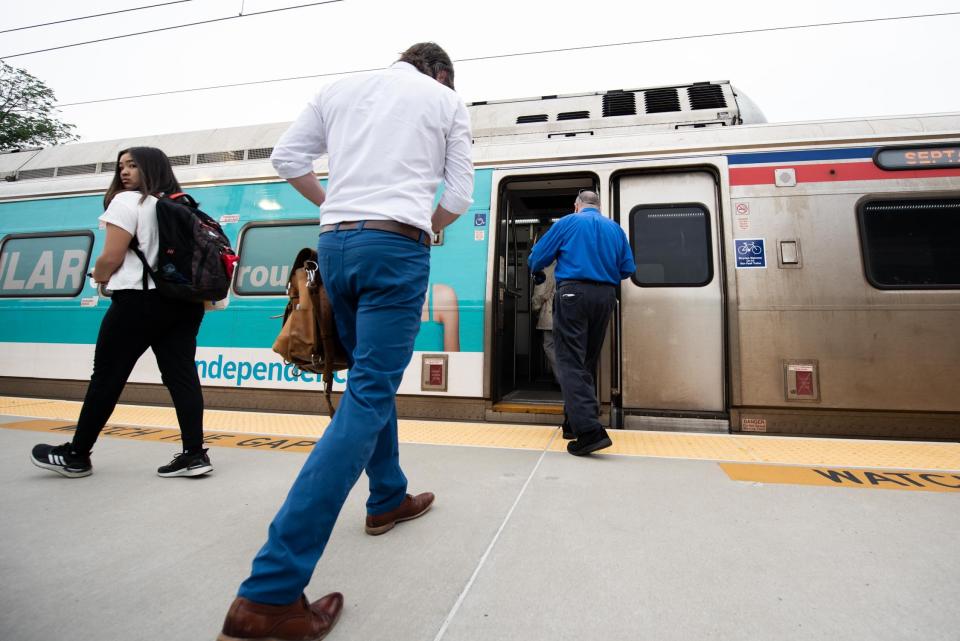 Passengers board a southbound train on SEPTA's West Trenton regional rail line at the Yardley station on Monday, June 12, 2023.