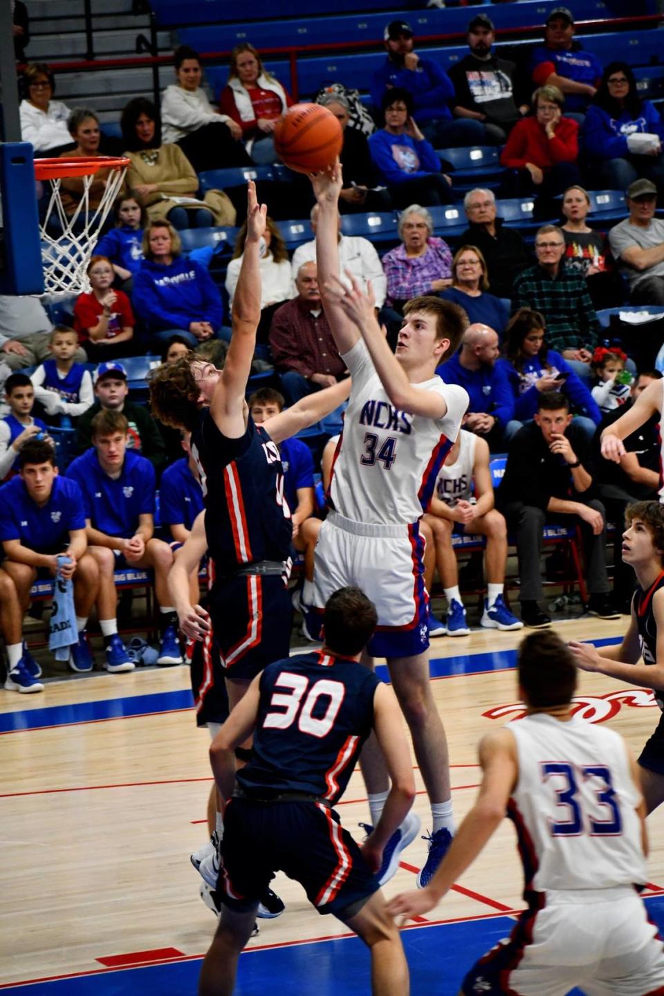 Nashville High School’s Bennett Briles goes up for a shot during a game this season. For his outstanding season, readers of bnd.com selected Briles as the Belleville News-Democrat’s Boys Basketball Player of the Year for 2022-23.