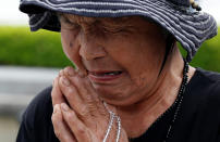 <p>Kinuyo Ikegami, 84, prays in front of the cenotaph for the victims of the 1945 atomic bombing, at Peace Memorial Park in Hiroshima, Japan May 27, 2016. (Photo: Toru Hanai/Reuters) </p>