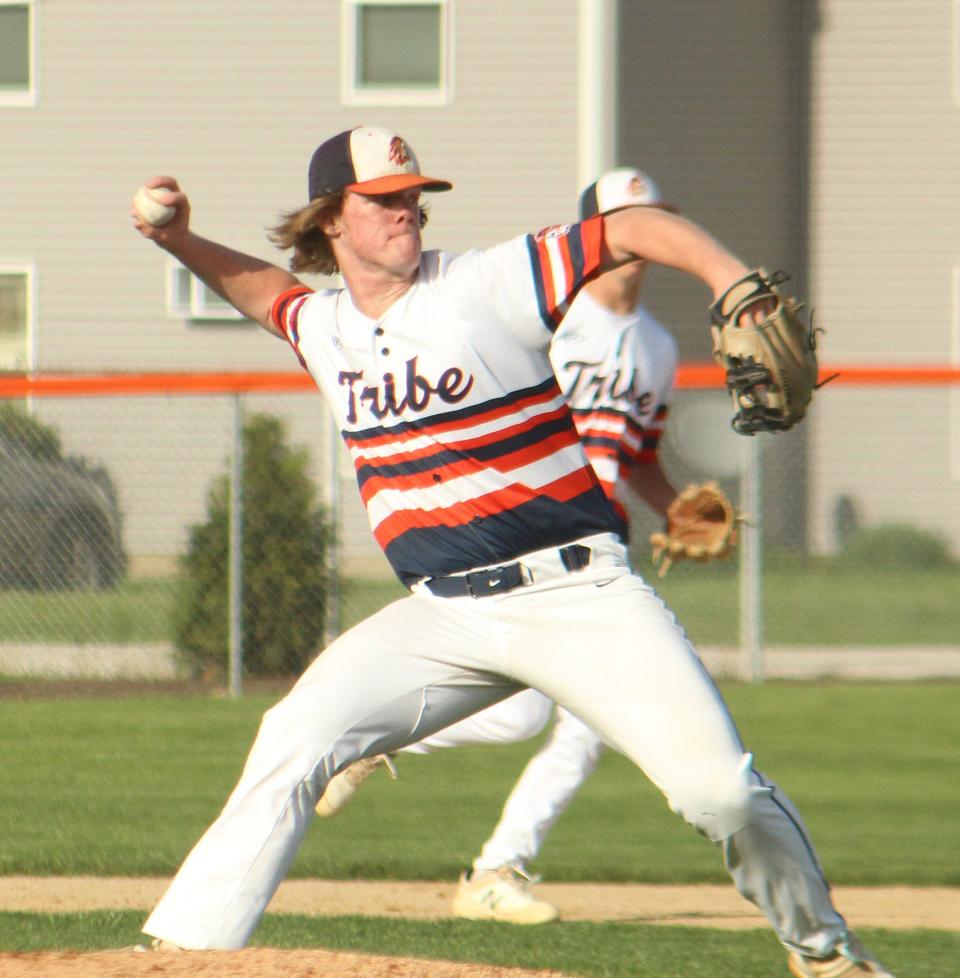 Pontiac hurler Zechariah Landstrom makes a throw to first after fielding the ball behind the mound Wednesday. Landstrom took the loss in a 9-2 setback to Eureka.