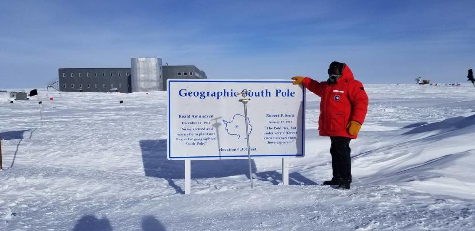 John Hood, a 2006 graduate of Carver High School and a 2014 graduate of Columbus State University, stands at the geographic South Pole while working for a month in 2019 on the South Pole Telescope.