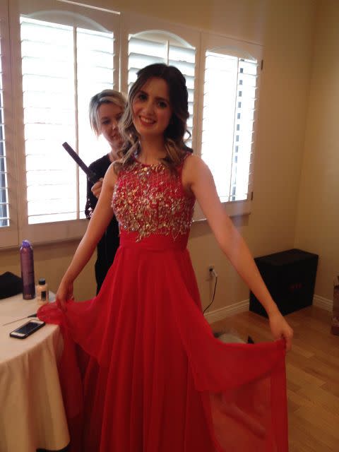 <p>The <em>Austin & Ally </em>star went girly-glam in a <a href="/prom/g925/laura-marano-prom-pictures/" data-ylk="slk:sequin red dress;elm:context_link;itc:0;sec:content-canvas" class="link ">sequin red dress</a> and loose waves.</p>