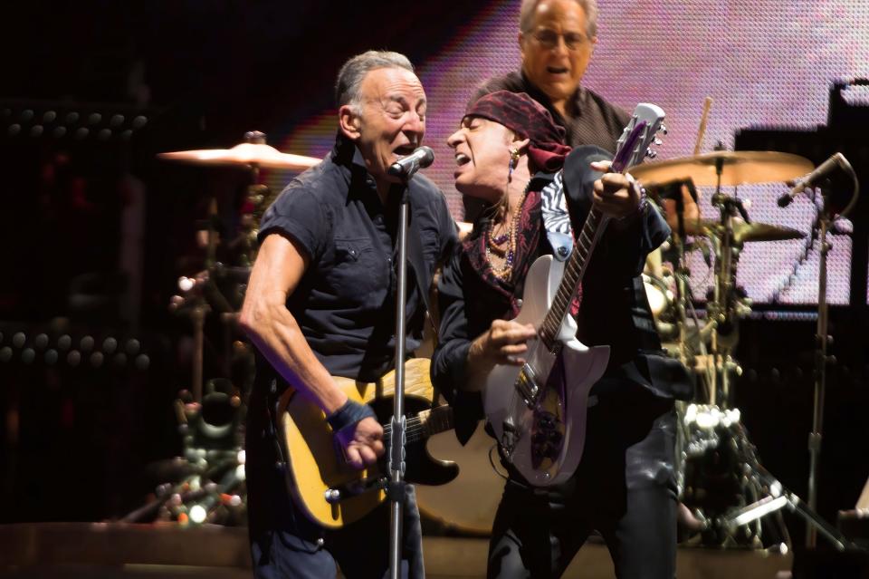 Bruce Springsteen, left, and Stevie Van Zandt performing at MetLife Stadium on Wednesday in East Rutherford, New Jersey.