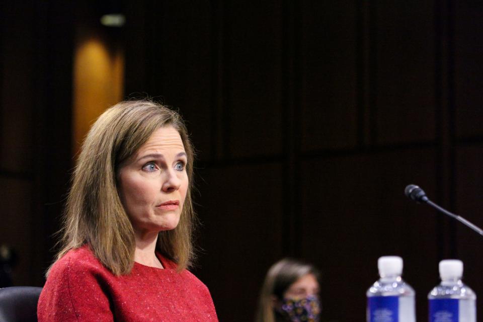 Supreme Court nominee Amy Coney Barrett listens during a confirmation hearing before the Senate Judiciary Committee on Tuesday.