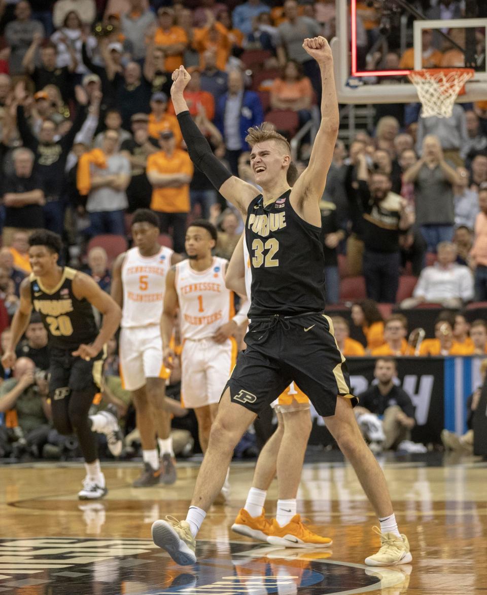 Matt Haarms of the Purdue Boilermakers cheers after their victory over Tennessee, NCAA Division 1 Men's Basketball 'Sweet Sixteen' game, KFC Yum Center, Louisville, Thursday, March 28, 2019. Purdue beat Tennessee 99-94. 