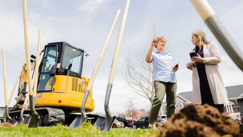 Taylorsville Mayor Kristie Overson speaks with Riverton City Council Member Tawnee McCay after a press conference announcing grants for the conversion of grass areas into more water-efficient landscaping at the West Jordan City Hall in West Jordan on April 27, 2023.