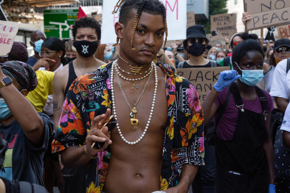  A protester making a gesture at parliament square during a demonstration.
Six weeks after the death of George Floyd in the US Black Lives Matter protests continue in London. (Photo by Thabo Jaiyesimi / SOPA Images/Sipa USA) 