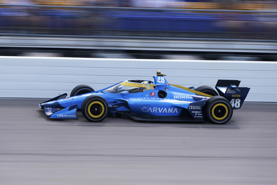 FILE - Jimmie Johnson drives during the IndyCar Series auto race Saturday, July 23, 2022, at Iowa Speedway in Newton, Iowa. Jimmie Johnson announced Friday, Sept. 9, 2022, that sponsor Carvana has agreed to fund next year's racing endeavors and the seven-time NASCAR champion will use the next few weeks to determine his 2023 schedule. (AP Photo/Charlie Neibergall, File)