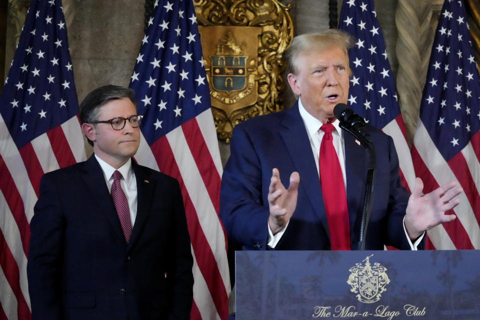 Republican presidential candidate former President Donald Trump speaks as Speaker of the House Mike Johnson, R-La., listens during a news conference, Friday, April 12, 2024, at Mar-a-Lago in Palm Beach, Fla. (AP Photo/Wilfredo Lee)