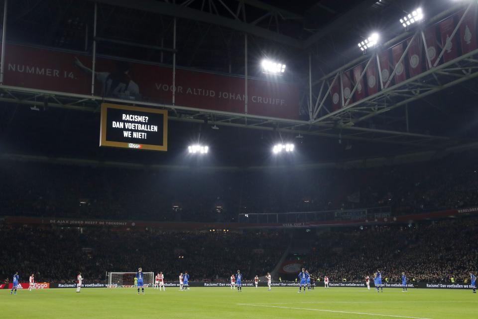 The Ajax and Heracles players had plenty of support during their protest against racism. (Photo by ANP Sport via Getty Images)