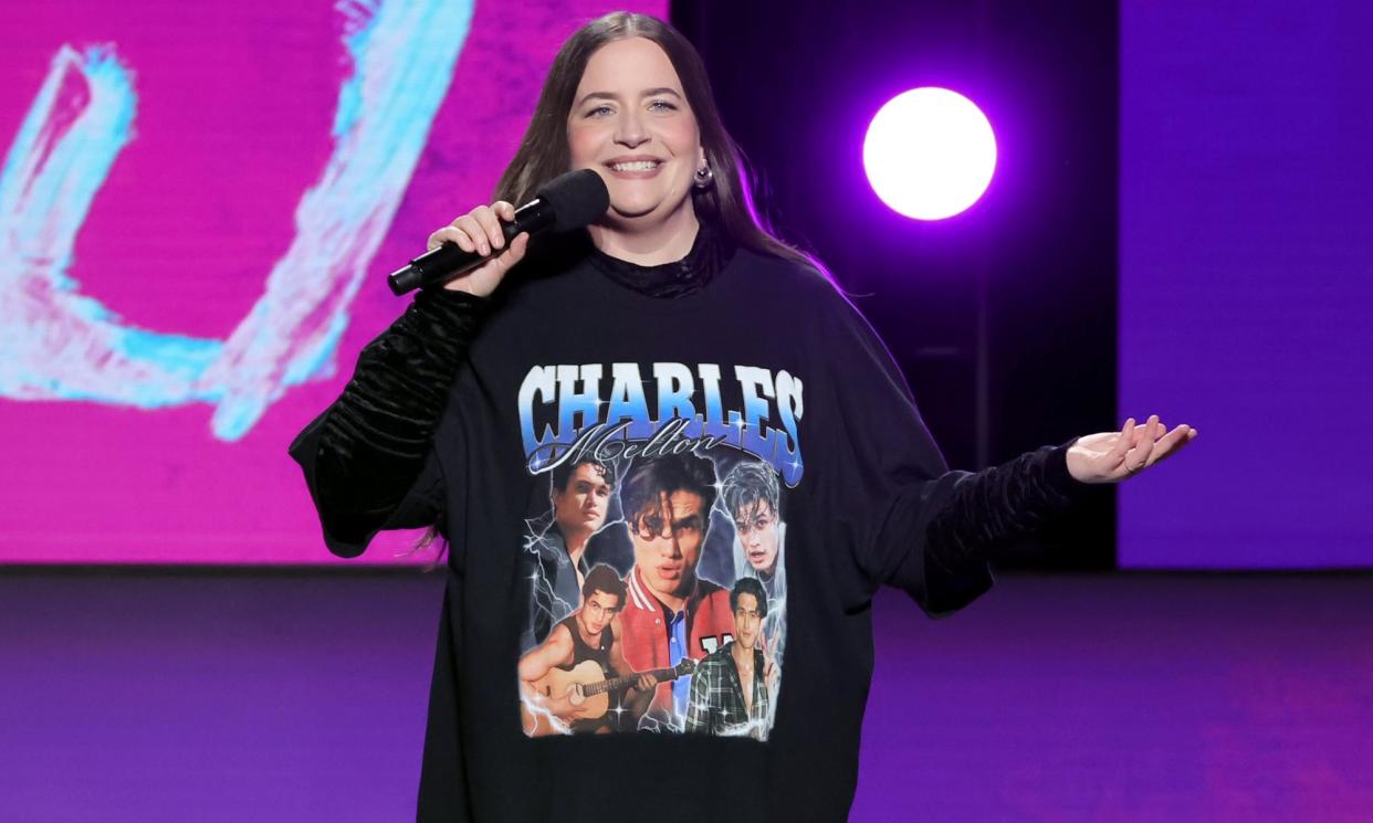 <span>Paying homage … Aidy Bryant wears a T-shirt displaying pictures of Charles Melton at the Film Independent Spirit awards.</span><span>Photograph: Kevin Winter/Getty Images</span>
