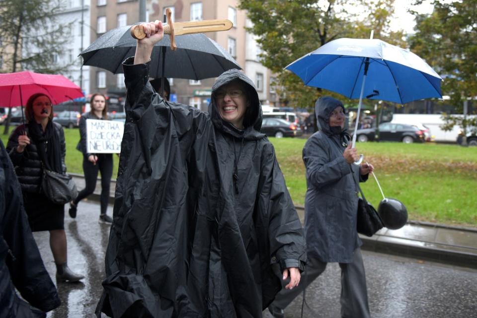 Women in Krakow marched through the rain to go on strike.&nbsp;