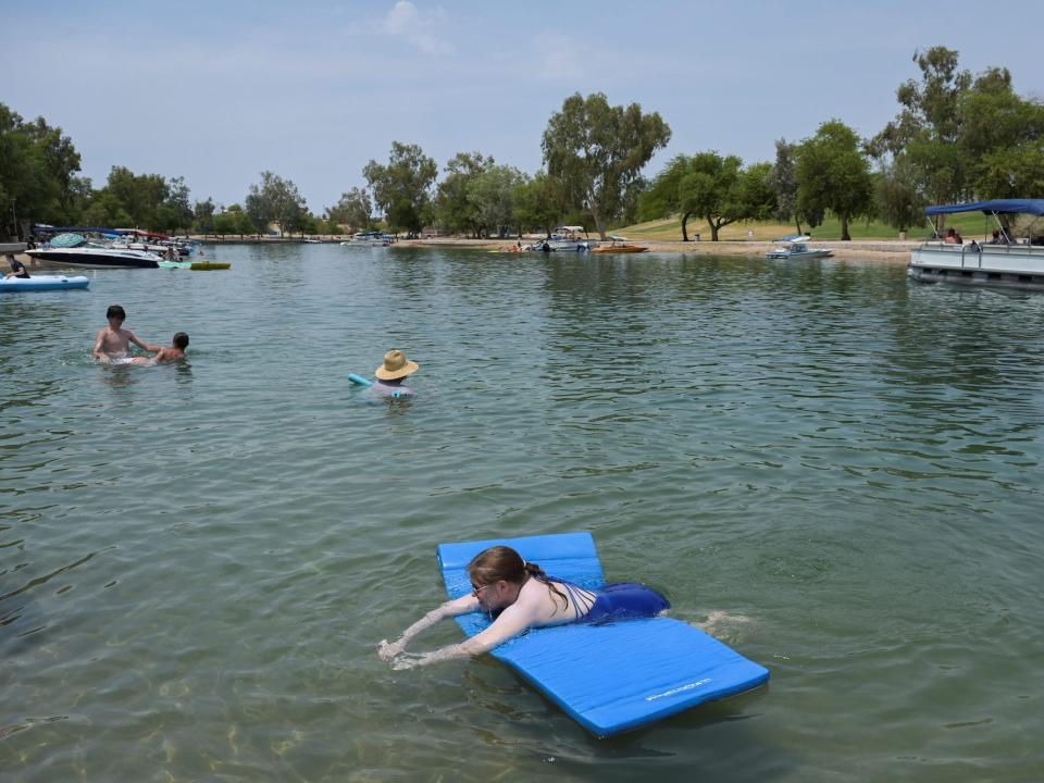 Sarah Bulat cools off in the water during a heat wave in Lake Havasu, Arizona, U.S. June 15, 2021.