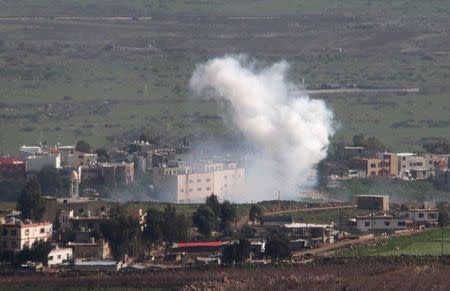 Smoke rises from shells fired from Israel over al-Wazzani area in southern Lebanon January 28, 2015. REUTERS/Karamallah Daher