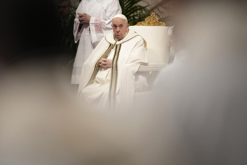 Pope Francis arrives to celebrate the Chrism Mass where the chrism, the oil of the catechumens and the oil of the sick are consecrated, and all the priests renew the promises made on the day of their ordination, inside St. Peter's Basilica, at the Vatican, Thursday, April 6, 2023. (AP Photo/Andrew Medichini)