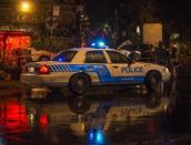 Police secure the Metropolis theatre after a gunman opened fire during the victory speech of Quebec's newly elected separatist premier, Pauline Marois of the Parti Quebecois, on September 4, in Montreal