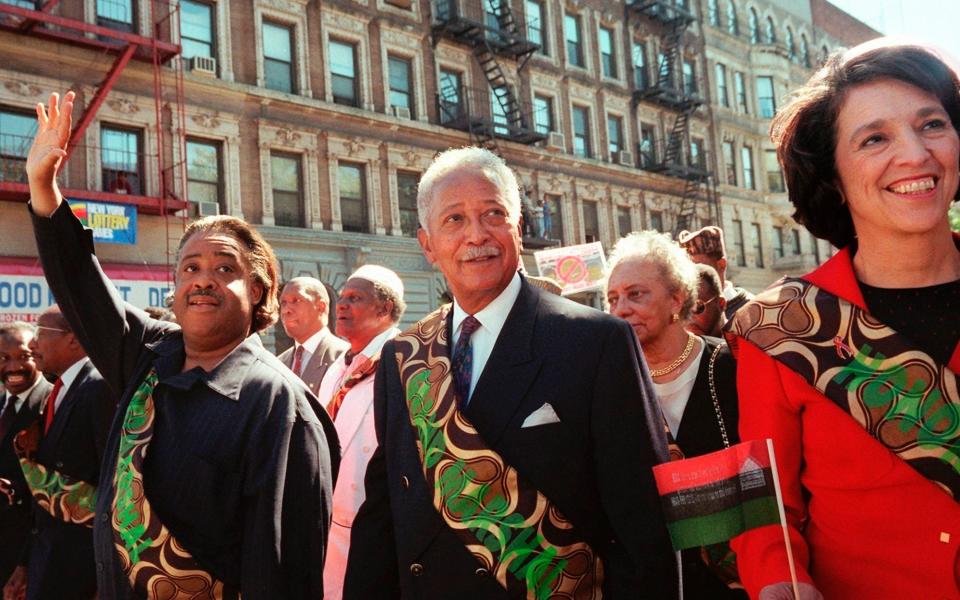 Marching at the front of the annual African-American Day Parade in Harlem in 1997 alongside Al Sharpton and Ruth Messinger - Michael Schmelling/AP