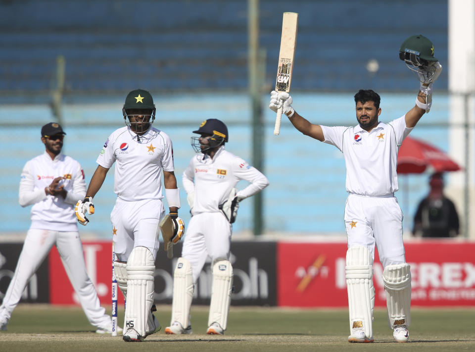 Pakistani batsman Azhar Ali acknowledges his 100 against Sri Lanka during the second Test in Karachi, Pakistan, Sunday, Dec. 22, 2019. (AP Photo/Fareed Khan)