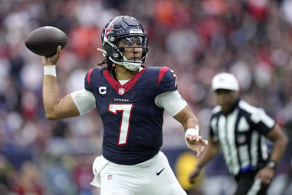 Houston Texans quarterback C.J. Stroud passes against the Denver Broncos in the first half of an NFL football game Sunday, Dec. 3, 2023, in Houston. (AP Photo/Eric Gay)