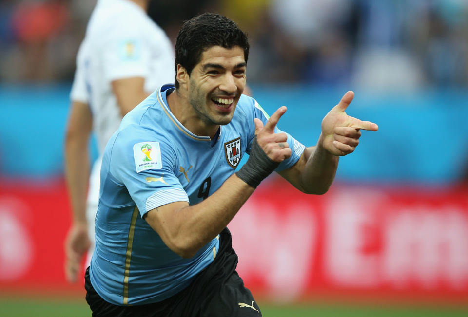 Luiz Suarez was at the center of controversy at both the 2010 and 2014 World Cups. (Photo by Richard Heathcote/Getty Images)