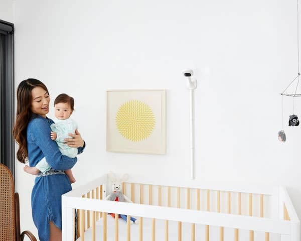 Keep an eye on your baby with this gadget that'll stream live HD and night vision to your smartphone. Just mount it above their crib and you can watch footage of them whenever you need to. <br /><br /><strong>Promising review:</strong> "A $250 camera? Am I crazy? Yes, I'm crazy about this camera. The Nanit is a big-time investment in everyone getting a good night's sleep. <strong>The camera mounts above the crib and streams live HD and night vision to iOS, Android, Kindle Fire or Echo Show devices. That essentially means your phone becomes a monitor (via the app) that you're less apt to lose and won't forget to charge.</strong> The night vision allowed us to hang back whenever we heard a noise so we could make better decisions about whether the baby's 'got this' or we needed to handle the situation. We get weekly reports on our baby's sleep patterns as well as updates and tips sent directly to the app. Not sure how we lived without this, would recommend to every parent." &mdash; <a href="https://www.buzzfeed.com/jmihaly" target="_blank" rel="noopener noreferrer">John Mihaly</a><strong><a href="https://amzn.to/3wANfjk" target="_blank" rel="noopener noreferrer"><br /><br />Get it from Amazon for $249.99.</a></strong>