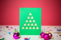 <p>If you can score a straight line with a craft knife (hey, there are rulers for a reason), you can create this modern tree. </p><p><em><a href="http://tinselandtrim.com/2016/12/diy-christmas-tree-cards/" rel="nofollow noopener" target="_blank" data-ylk="slk:See more at Tinsel and Trim »;elm:context_link;itc:0;sec:content-canvas" class="link ">See more at Tinsel and Trim »</a></em><br></p>