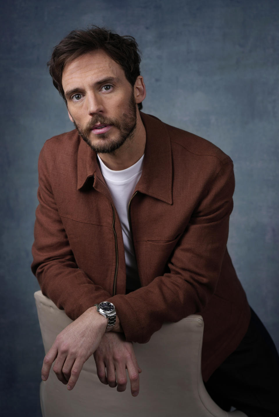 Sam Claflin, a cast member in the streaming miniseries "Daisy Jones and the Six," poses for a portrait at the Four Seasons Hotel, Tuesday, Feb. 21, 2023, in Los Angeles. (AP Photo/Chris Pizzello)