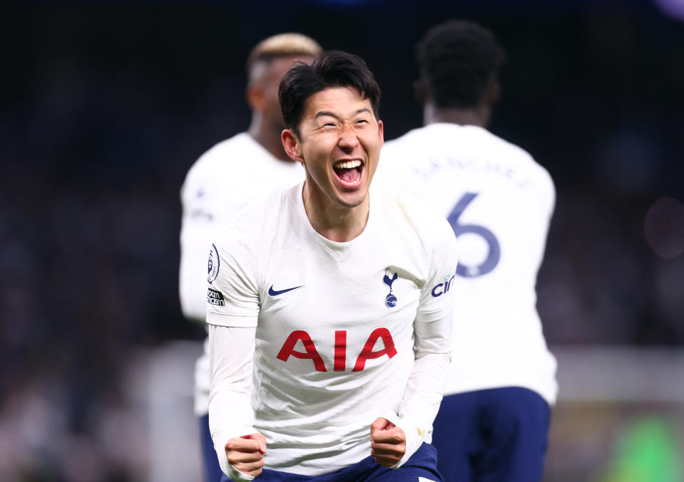 LONDON, ENGLAND - MAY 12: Heung-Min Son of Tottenham Hotspur celebrates after scoring their side's third goal during the Premier League match between Tottenham Hotspur and Arsenal at Tottenham Hotspur Stadium on May 12, 2022 in London, England. (Photo by Clive Rose/Getty Images)