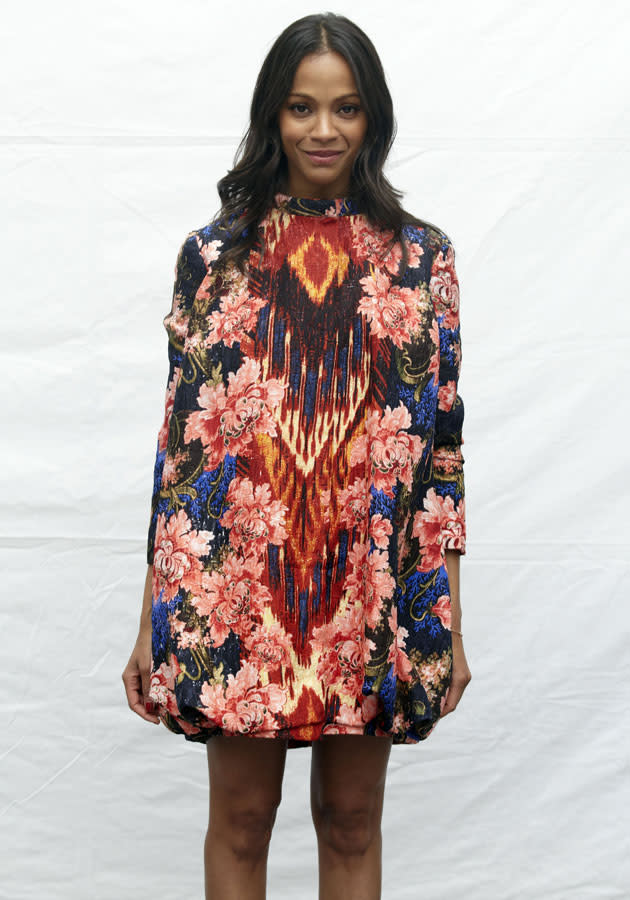 Zoe Saldana looked pretty in a graphic printed frock for a London photocall.