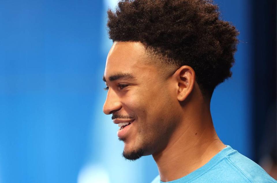 Carolina Panthers quarterback Bryce Young smiles as he responds to a question from the media during a press conference on Tuesday, July 23, 2024 at Bank of America Stadium in Charlotte, NC. The team is hosting training camp in Charlotte, NC this year after leaving Spartanburg, SC.